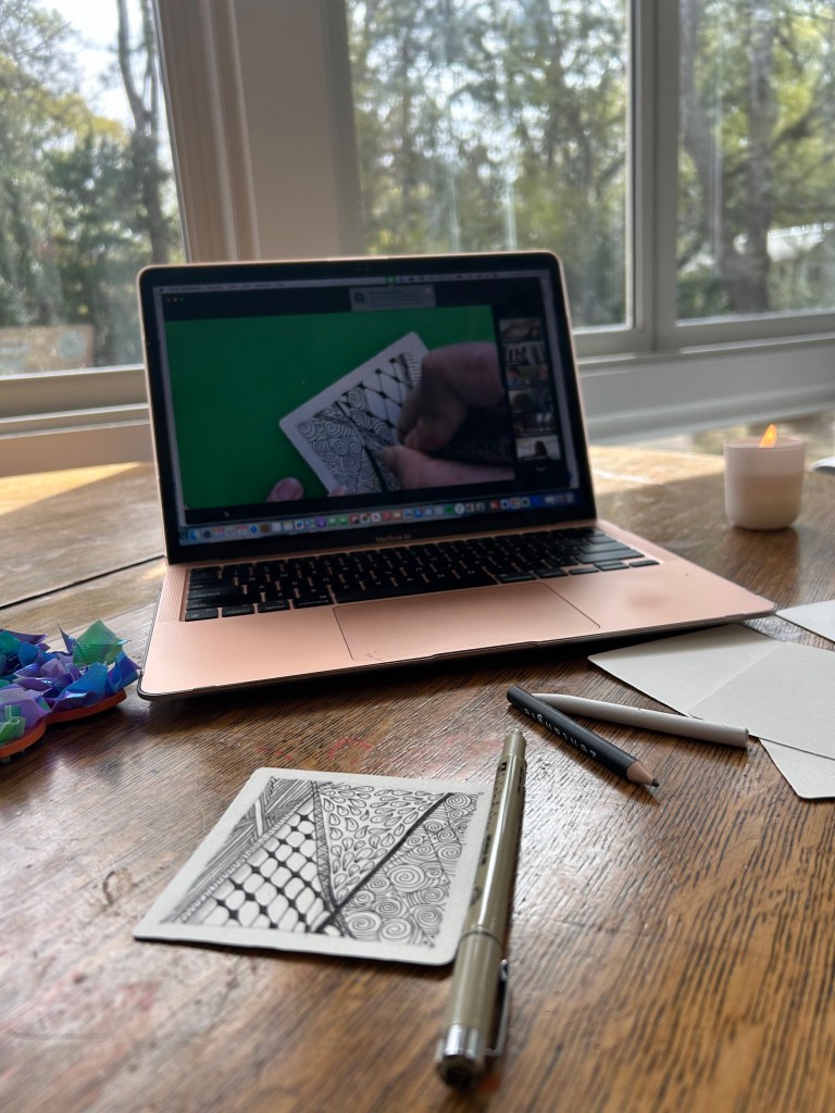 Emily's laptop screen showing her teaching an online zentangle workshop
