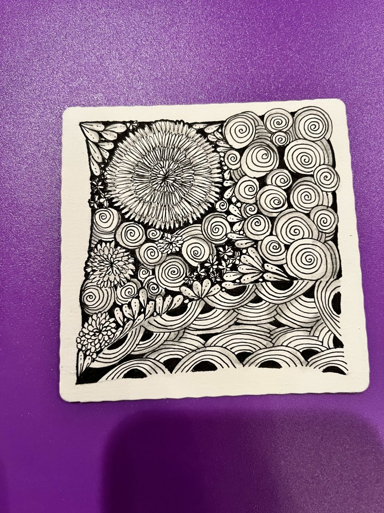 Emily's personal zentangle design inspired by yellow dahlia flower