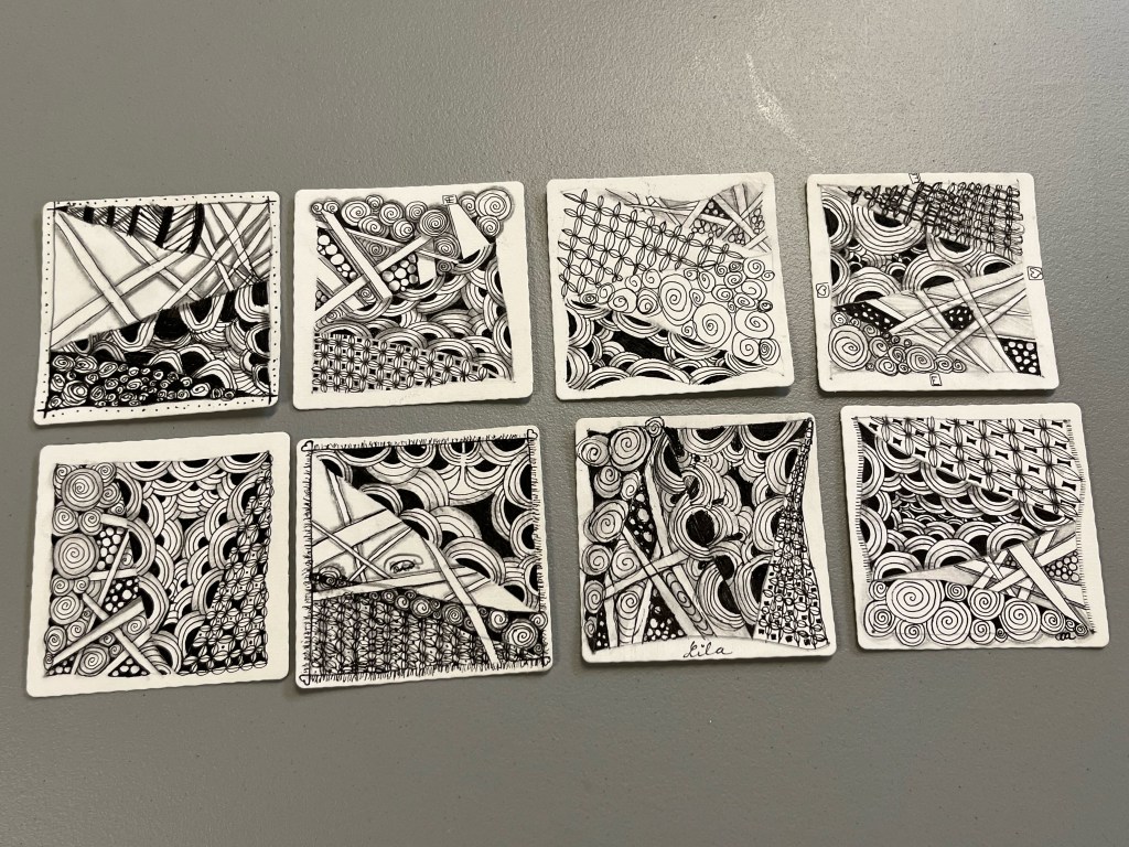 grouping of zentangle art created by workshop participants