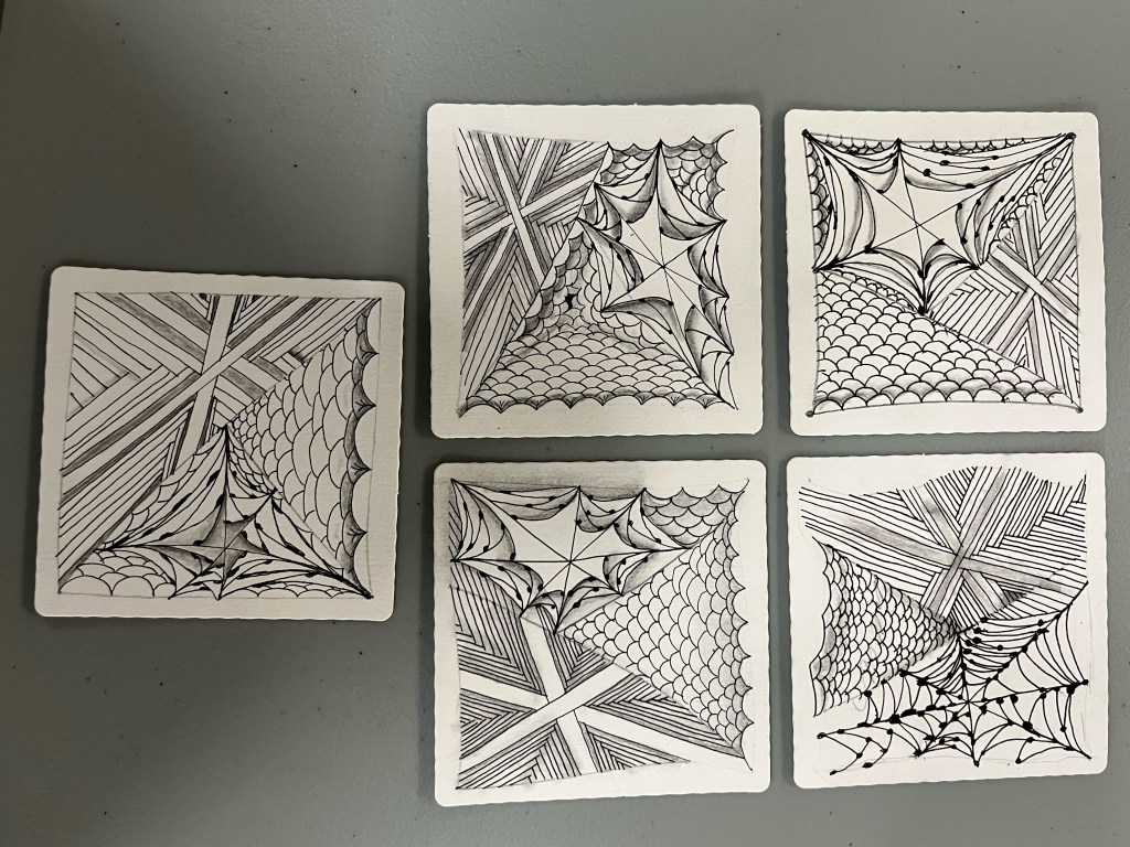 grouping of zentangle art created by workshop participants