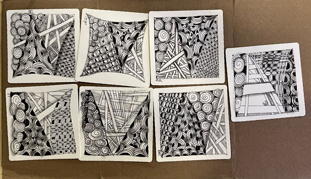 grouping of zentangle art created by workshop participants